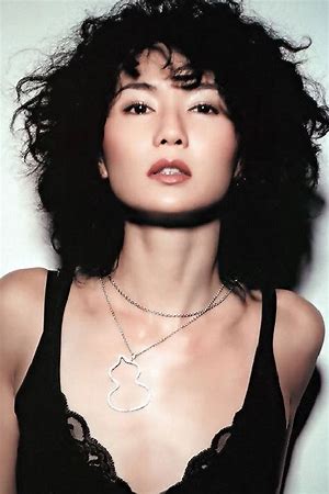 When was Maggie Cheung born?